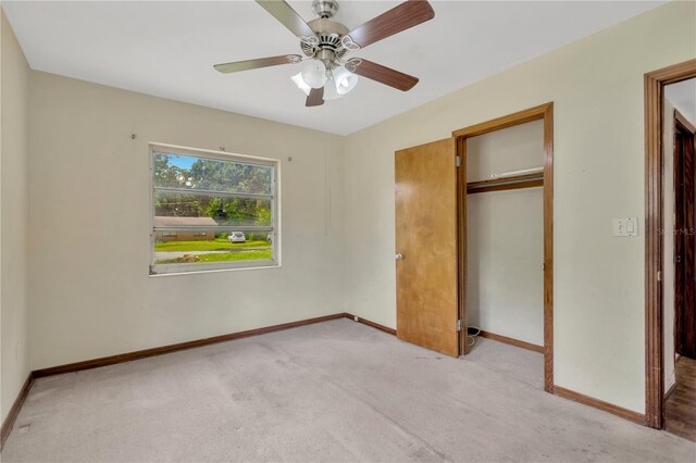 603 Clay Ct, Brandon, FL 33510 - unfurnished bedroom with light carpet, a closet, and a ceiling fan