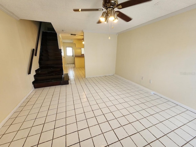 6620 121st Ave Unit 1, Largo, FL 33773 - unfurnished living room with a ceiling fan, stairway, crown molding, a textured ceiling, and light tile patterned floors