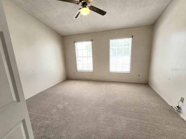 6620 121st Ave Unit 1, Largo, FL 33773 - carpeted spare room featuring a textured ceiling and ceiling fan