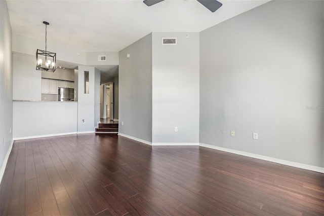501 S Moody Ave Unit 1134, Tampa, FL 33609 - unfurnished living room featuring a ceiling fan, dark wood-type flooring, and a chandelier