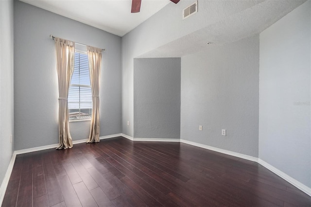 501 S Moody Ave Unit 1134, Tampa, FL 33609 - empty room with a ceiling fan, hardwood / wood-style floors, and a textured wall