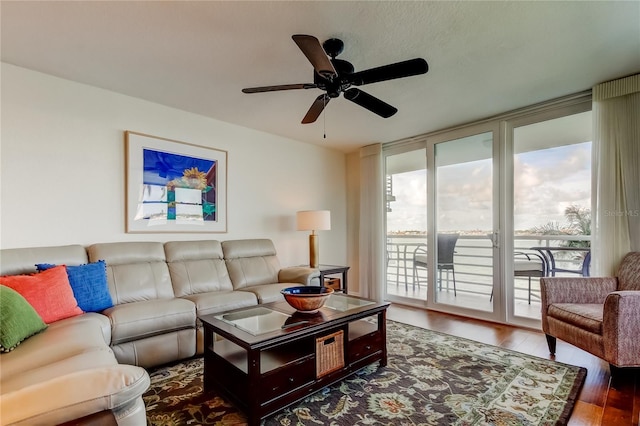 6105 Bahia Del Mar Cir Unit 388, Saint Petersburg, FL 33715 - living room featuring wood finished floors and a ceiling fan