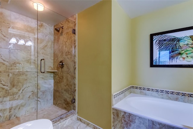 6105 Bahia Del Mar Cir Unit 388, Saint Petersburg, FL 33715 - bathroom featuring a shower stall and a garden tub