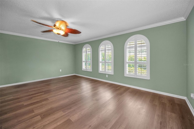 11279 Oakridge Trl, Seminole, FL 33772 - empty room with ceiling fan, dark wood-style flooring, ornamental molding, and a textured ceiling