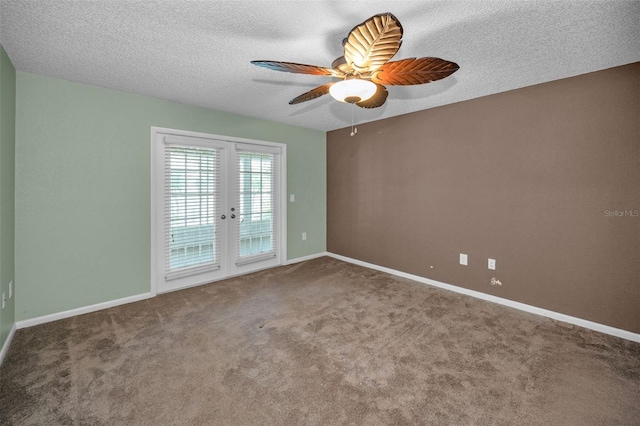 11279 Oakridge Trl, Seminole, FL 33772 - spare room with a ceiling fan, carpet, a textured ceiling, and french doors