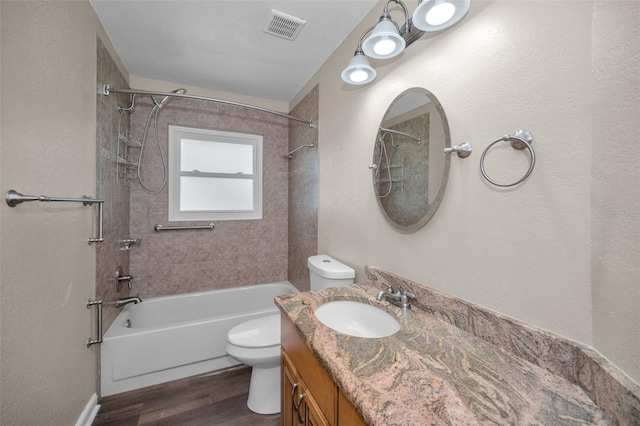 11279 Oakridge Trl, Seminole, FL 33772 - bathroom featuring  shower combination, wood finished floors, and vanity