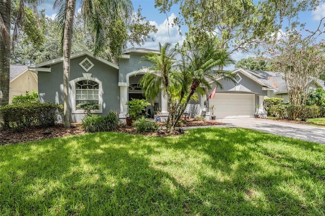 7224 Yardley Way, Tampa, FL 33647 - view of front of home featuring stucco siding, a garage, driveway, and a front yard