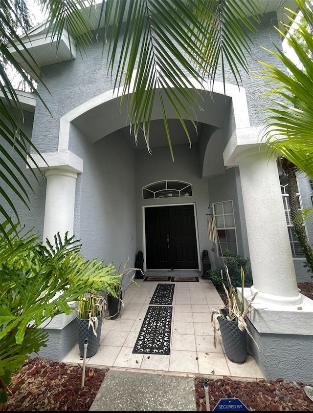 7224 Yardley Way, Tampa, FL 33647 - property entrance with stucco siding
