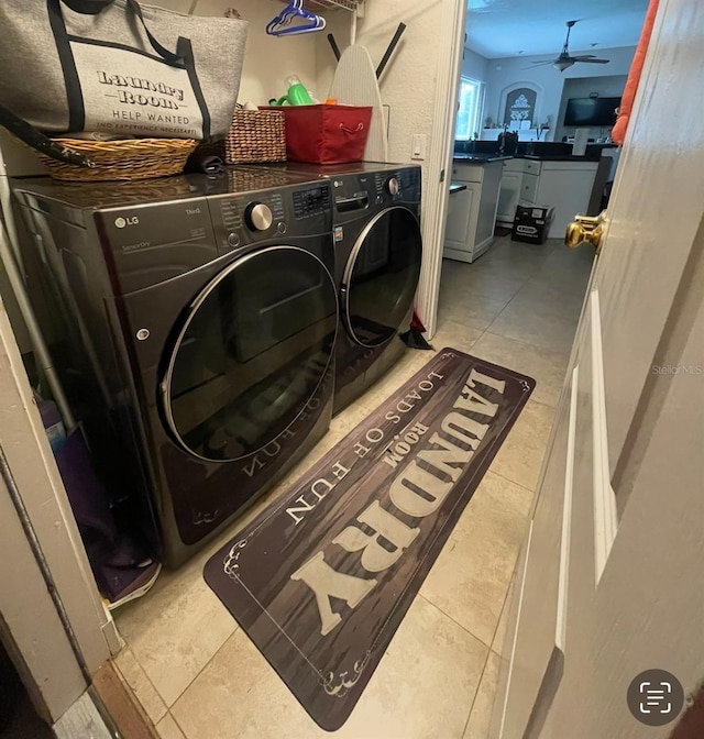 7224 Yardley Way, Tampa, FL 33647 - laundry room featuring washer and dryer, a ceiling fan, and tile patterned floors