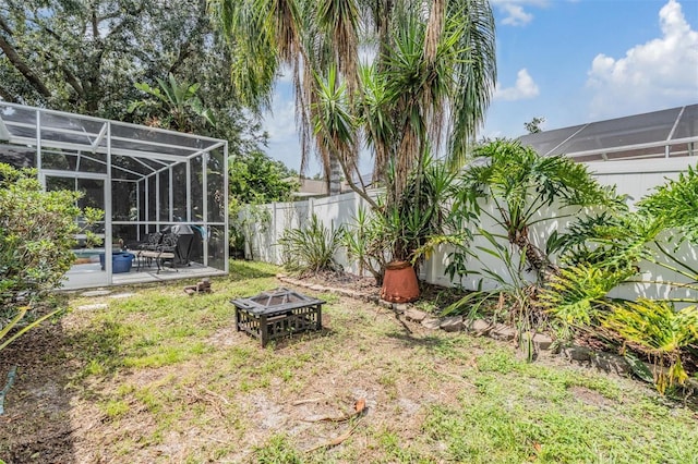 7224 Yardley Way, Tampa, FL 33647 - fenced backyard with an outdoor fire pit, a patio area, and a lanai