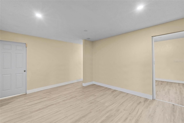 523 Northride Trl, Lakeland, FL 33813 - unfurnished bedroom with light wood-style floors, recessed lighting, and a closet