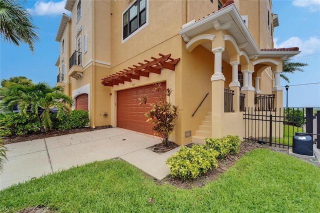 6412 Mayra Shores Ln, Apollo Beach, FL 33572 - view of property exterior featuring stucco siding, an attached garage, and concrete driveway
