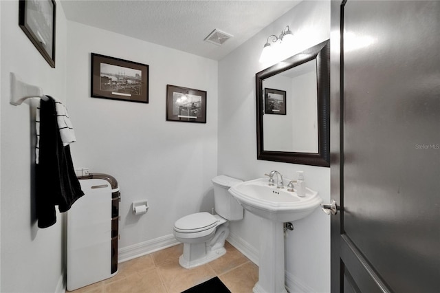 6412 Mayra Shores Ln, Apollo Beach, FL 33572 - bathroom featuring baseboards and tile patterned floors