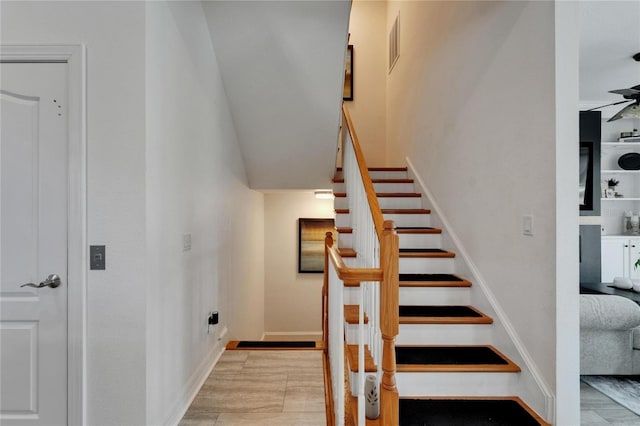 6412 Mayra Shores Ln, Apollo Beach, FL 33572 - stairway featuring baseboards