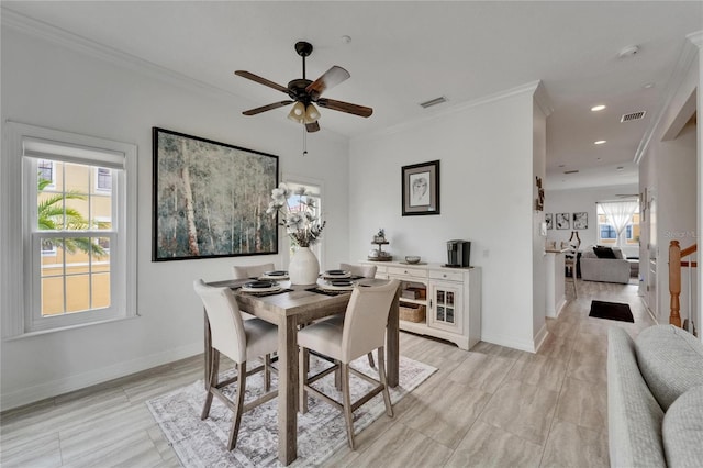 6412 Mayra Shores Ln, Apollo Beach, FL 33572 - dining area with ceiling fan, recessed lighting, and ornamental molding