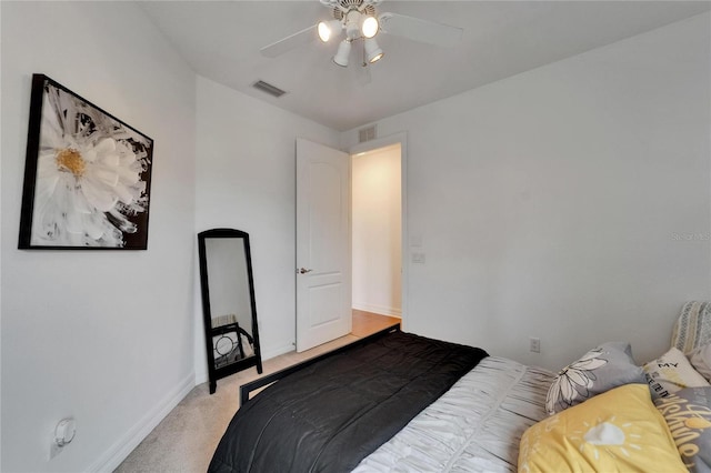 6412 Mayra Shores Ln, Apollo Beach, FL 33572 - bedroom with light colored carpet and ceiling fan