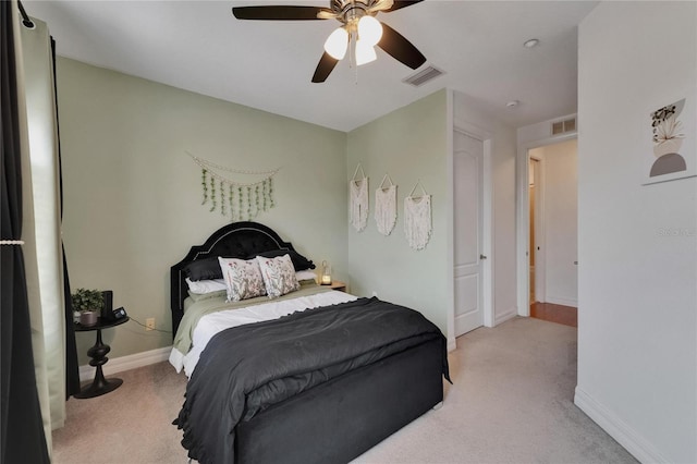 6412 Mayra Shores Ln, Apollo Beach, FL 33572 - carpeted bedroom with baseboards and ceiling fan
