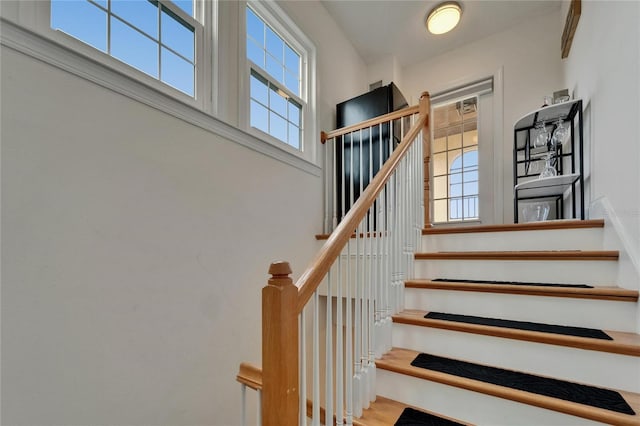 6412 Mayra Shores Ln, Apollo Beach, FL 33572 - staircase featuring a high ceiling