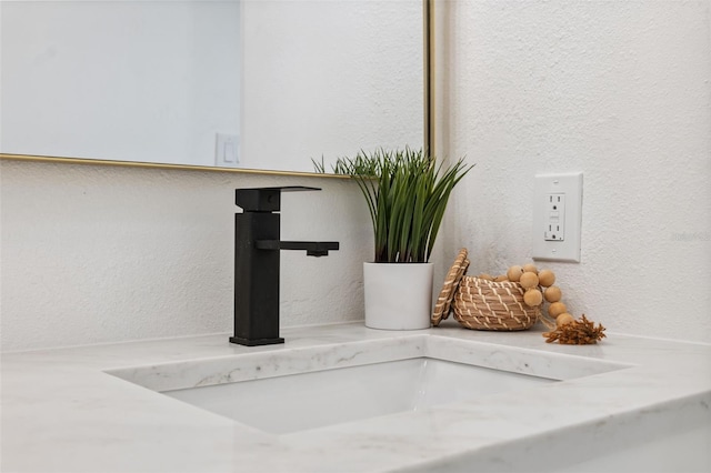8256 Lark St, Seminole, FL 33777 - bathroom view of a textured wall and vanity