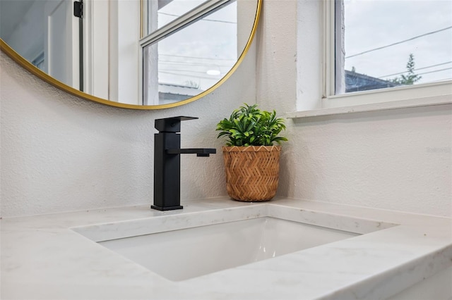 8256 Lark St, Seminole, FL 33777 - bathroom view of a sink and a textured wall