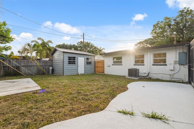 8256 Lark St, Seminole, FL 33777 - fenced backyard with a patio and a shed