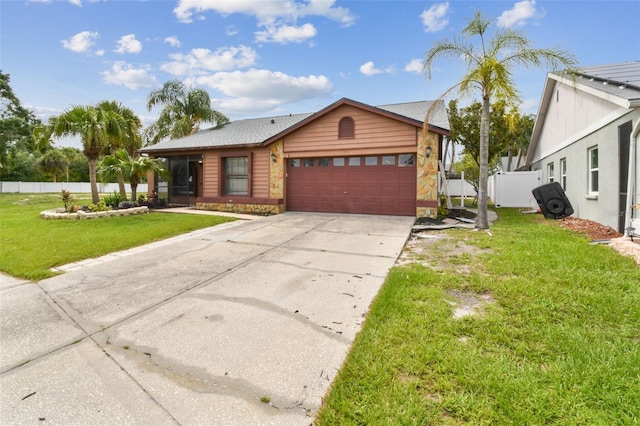 11304 Plumtree Ct, Riverview, FL 33579 - view of front of home featuring an attached garage, driveway, stone siding, and a sunroom
