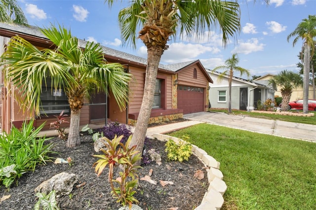 11304 Plumtree Ct, Riverview, FL 33579 - ranch-style house featuring concrete driveway, an attached garage, and a front lawn
