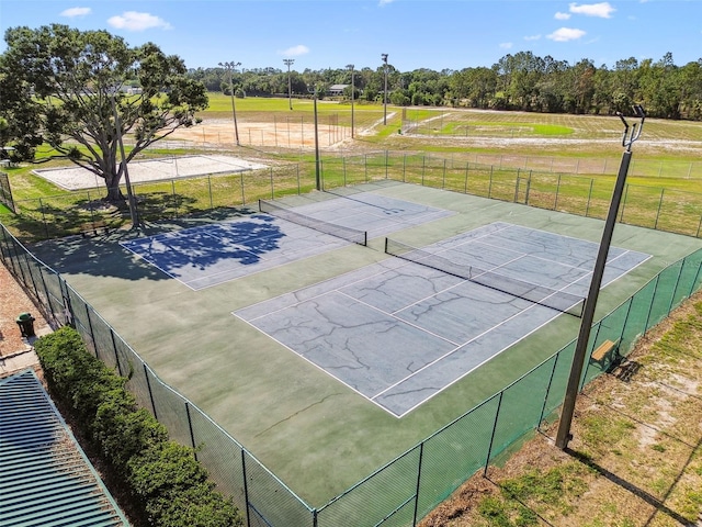 11304 Plumtree Ct, Riverview, FL 33579 - view of tennis court with view of wooded area