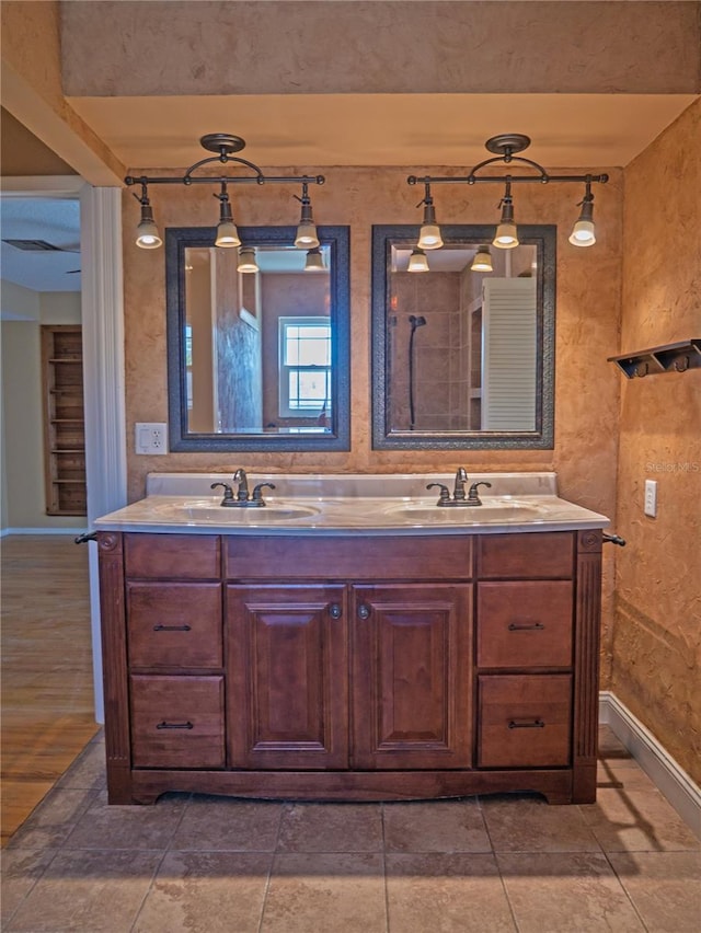 8759 Orient Way NE, Saint Petersburg, FL 33702 - full bathroom featuring double vanity and track lighting