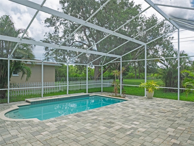 8759 Orient Way NE, Saint Petersburg, FL 33702 - view of pool featuring a patio and glass enclosure