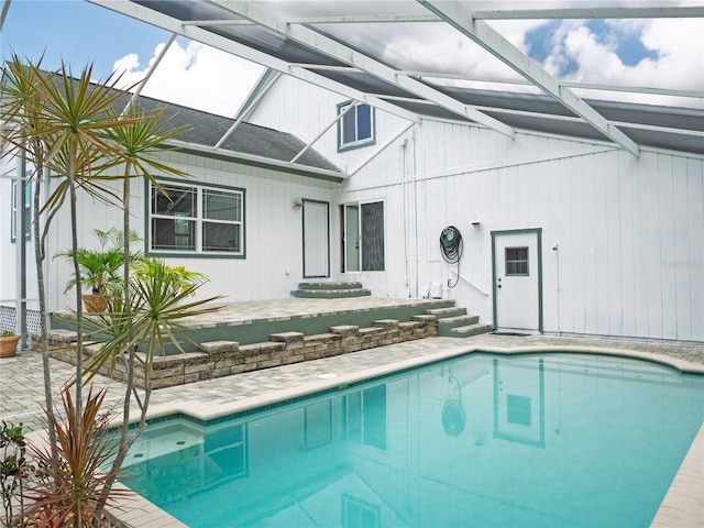 8759 Orient Way NE, Saint Petersburg, FL 33702 - swimming pool with a patio, glass enclosure, and entry steps