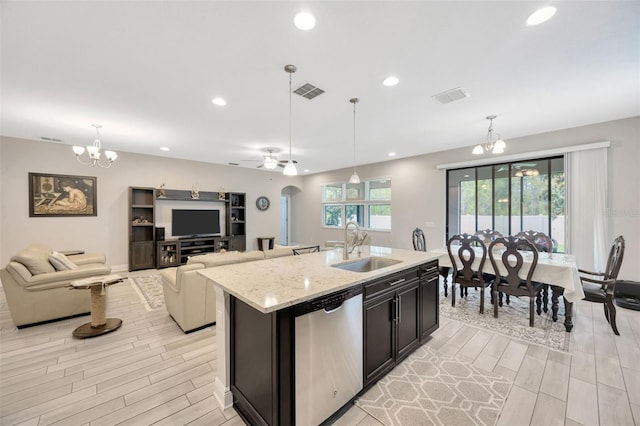18125 Roseate Dr, Lutz, FL 33558 - kitchen with dishwasher, wood tiled floors, a chandelier, decorative light fixtures, and recessed lighting