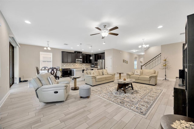 18125 Roseate Dr, Lutz, FL 33558 - living room with a ceiling fan, light wood-style floors, plenty of natural light, and recessed lighting