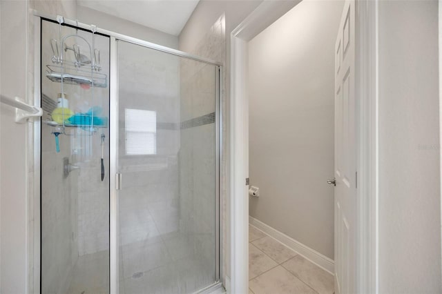 18125 Roseate Dr, Lutz, FL 33558 - bathroom featuring a stall shower and tile patterned floors