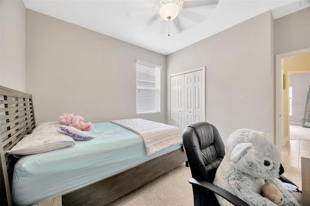 18125 Roseate Dr, Lutz, FL 33558 - carpeted bedroom with a closet and a ceiling fan