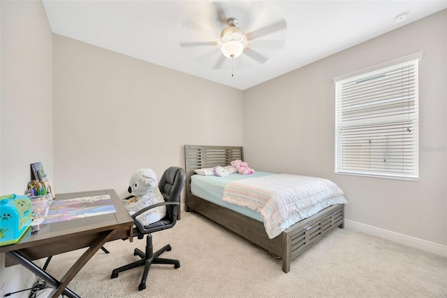 18125 Roseate Dr, Lutz, FL 33558 - carpeted bedroom featuring a desk and ceiling fan