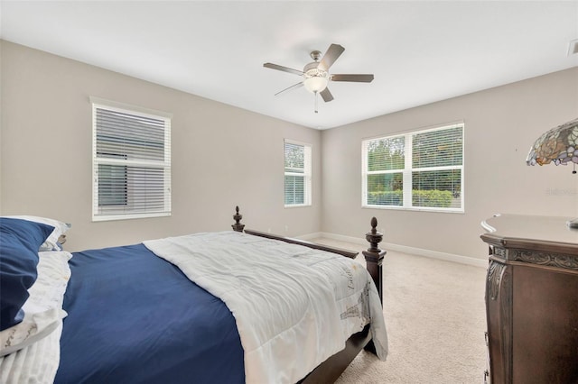 18125 Roseate Dr, Lutz, FL 33558 - carpeted bedroom featuring baseboards and ceiling fan