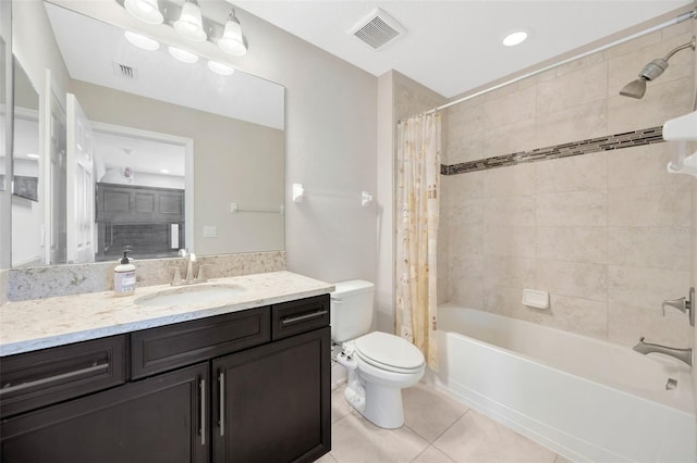 18125 Roseate Dr, Lutz, FL 33558 - bathroom featuring vanity, tile patterned floors, and shower / bath combo