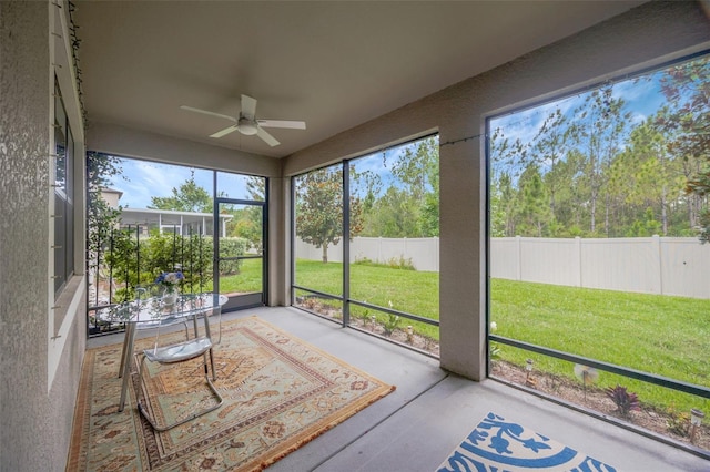 18125 Roseate Dr, Lutz, FL 33558 - unfurnished sunroom with a ceiling fan