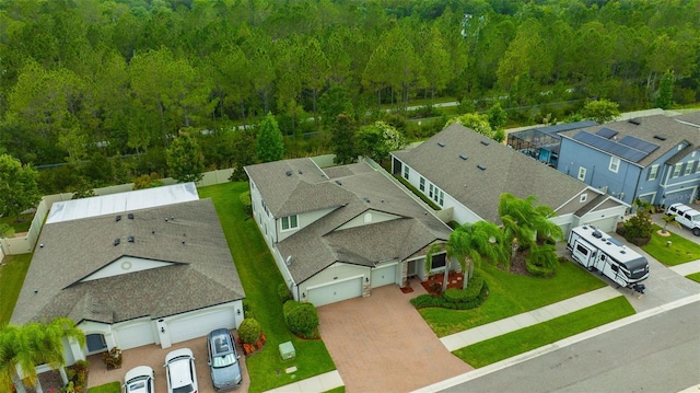 18125 Roseate Dr, Lutz, FL 33558 - aerial view of residential area featuring a forest