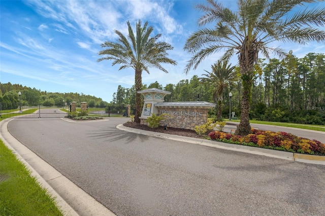 18125 Roseate Dr, Lutz, FL 33558 - community / neighborhood sign featuring a gate