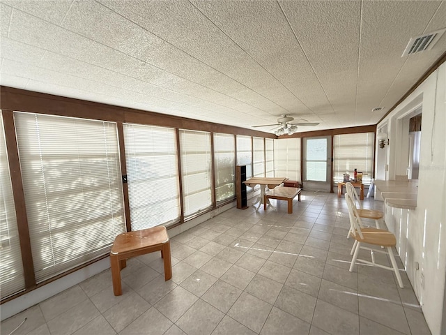 10181 44th Way N Unit 2, Pinellas Park, FL 33782 - unfurnished sunroom featuring tile patterned flooring