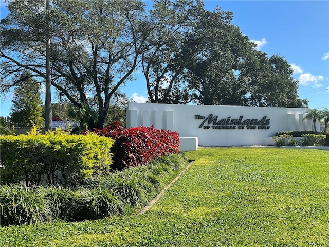 10181 44th Way N Unit 2, Pinellas Park, FL 33782 - community / neighborhood sign featuring a lawn