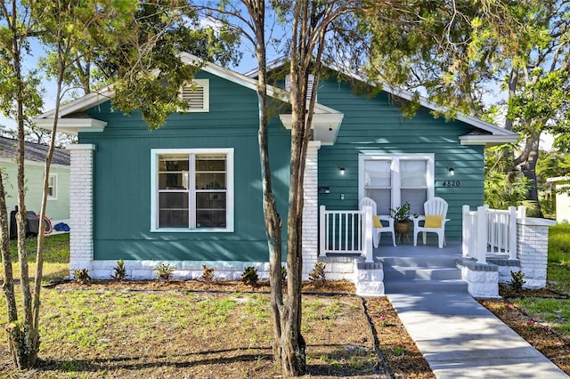 4820 8th Ave S, Saint Petersburg, FL 33711 - shotgun-style home with covered porch