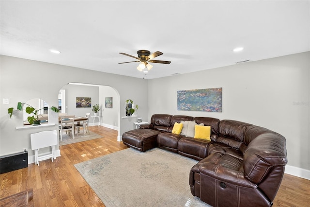 4820 8th Ave S, Saint Petersburg, FL 33711 - living area with arched walkways, wood finished floors, a ceiling fan, and recessed lighting