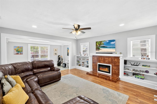 4820 8th Ave S, Saint Petersburg, FL 33711 - living area featuring ceiling fan, wood finished floors, healthy amount of natural light, and recessed lighting