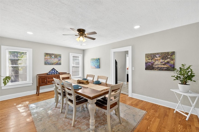 4820 8th Ave S, Saint Petersburg, FL 33711 - dining room featuring a textured ceiling, light wood finished floors, ceiling fan, and recessed lighting
