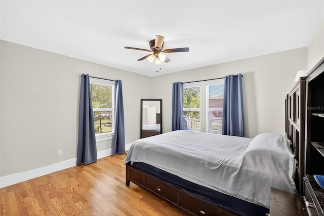 4820 8th Ave S, Saint Petersburg, FL 33711 - bedroom with light wood-style flooring and ceiling fan