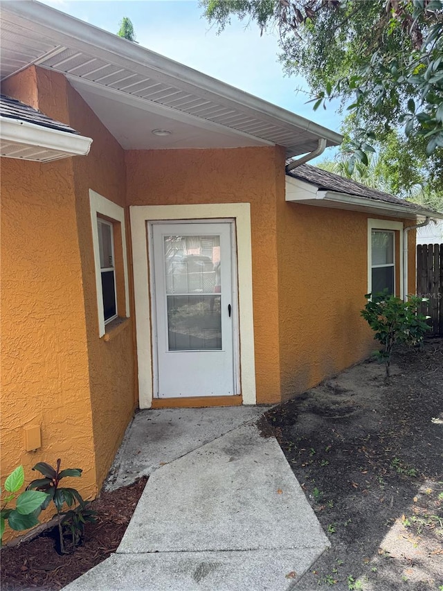 3407 E Comanche Ave, Tampa, FL 33610 - property entrance featuring stucco siding