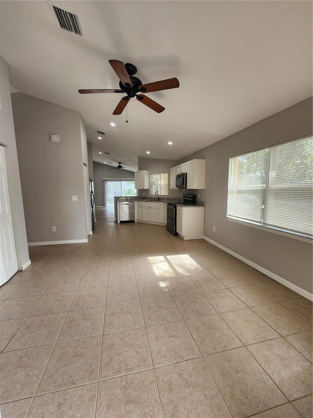 3407 E Comanche Ave, Tampa, FL 33610 - unfurnished living room featuring ceiling fan, light tile patterned flooring, and recessed lighting
